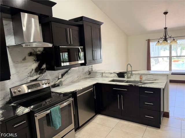 702 Calvin AVE, Lehigh Acres, FL 33972