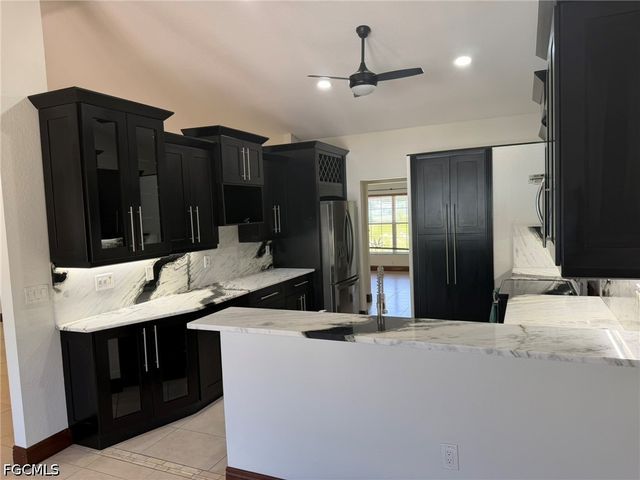 702 Calvin AVE, Lehigh Acres, FL 33972