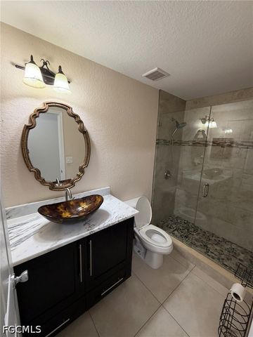 702 Calvin AVE, Lehigh Acres, FL 33972