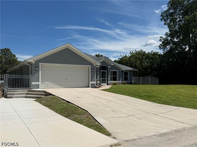 702 Calvin AVE, Lehigh Acres, FL 33972