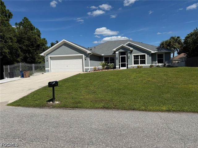 702 Calvin AVE, Lehigh Acres, FL 33972
