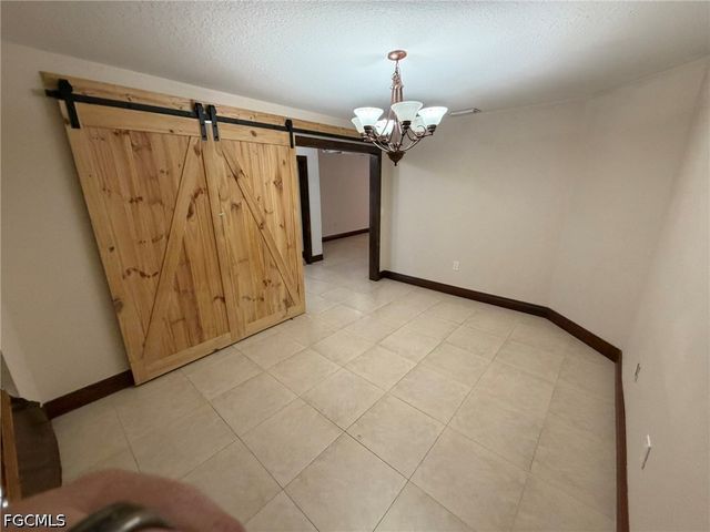 702 Calvin AVE, Lehigh Acres, FL 33972