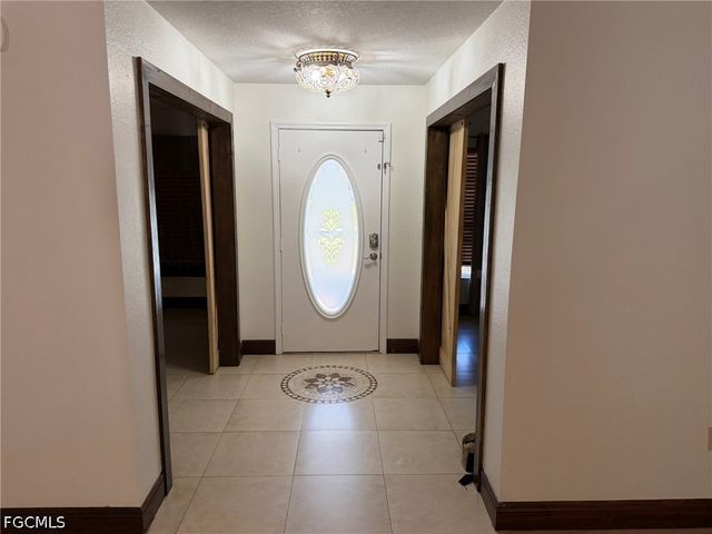 702 Calvin AVE, Lehigh Acres, FL 33972
