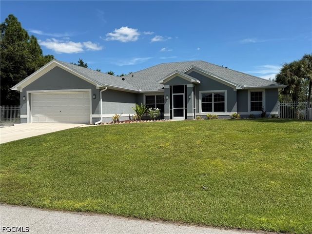 702 Calvin AVE, Lehigh Acres, FL 33972