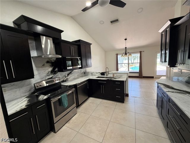 702 Calvin AVE, Lehigh Acres, FL 33972