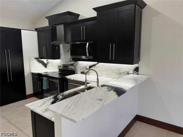 702 Calvin AVE, Lehigh Acres, FL 33972