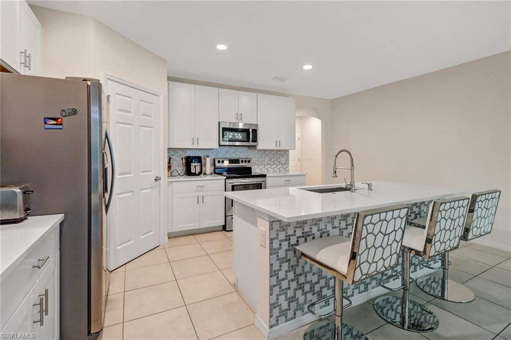 742 HADLEY PL W, NAPLES, FL 34104 — photo 4