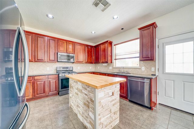 8311 Rocky River Street, Cove, TX 77523