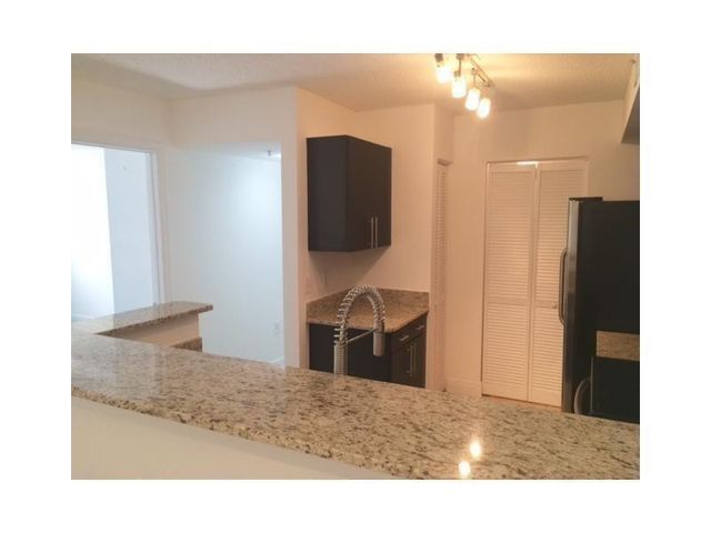 4820 N State Road 7 203, Coconut Creek, FL 33073