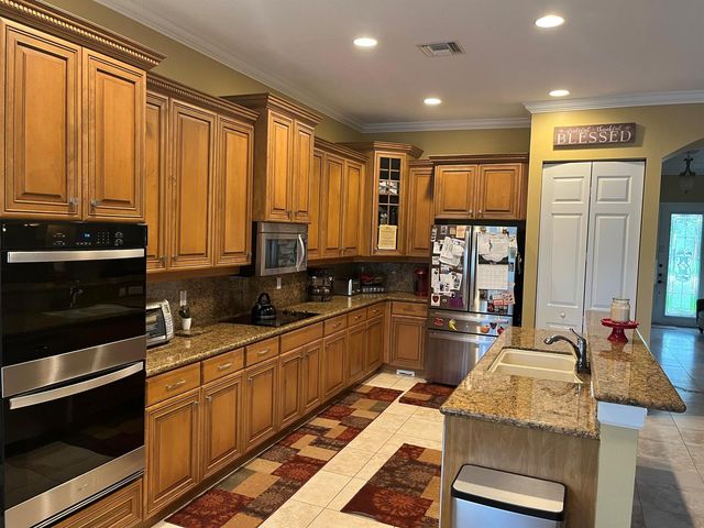 9386 Madewood Court, Royal Palm Beach, FL 33411