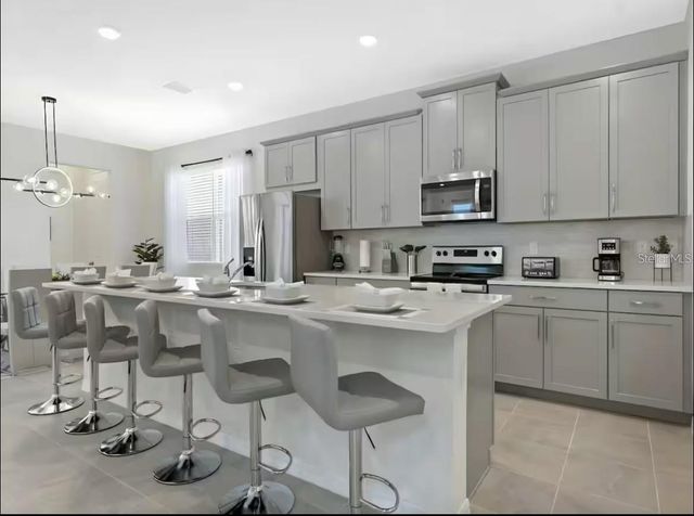 1929 TROPICAL PALMS CIRCLE, Kissimmee, FL 34747