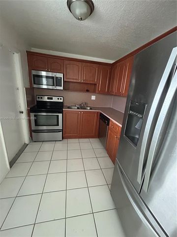 14180 SW 84th St 208-G, Miami, FL 33183
