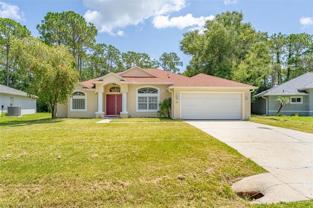 103 WOODSIDE DRIVE, Palm Coast, FL 32164