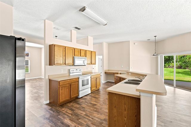103 WOODSIDE DRIVE, Palm Coast, FL 32164