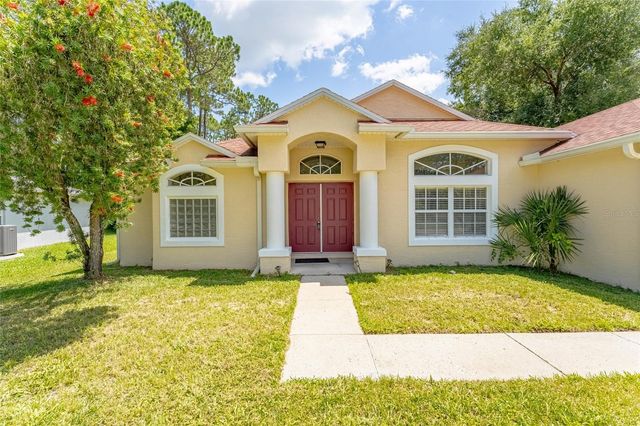 103 WOODSIDE DRIVE, Palm Coast, FL 32164