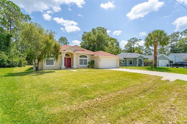103 WOODSIDE DRIVE, Palm Coast, FL 32164