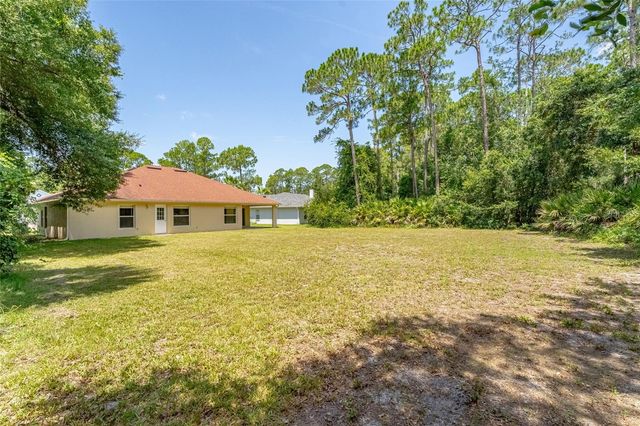 103 WOODSIDE DRIVE, Palm Coast, FL 32164