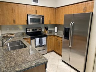 6400 Emerald Dunes Dr #303, West Palm Beach, FL 33411