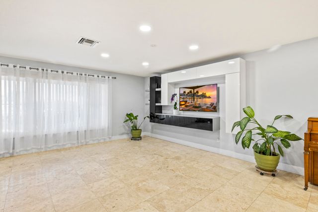 8361 Wilton Drive, Lake Clarke Shores, FL 33406