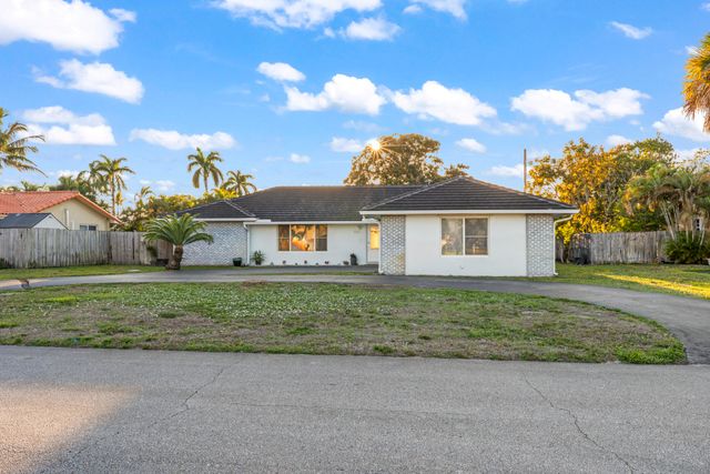 8361 Wilton Drive, Lake Clarke Shores, FL 33406