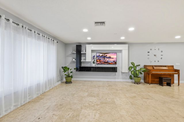 8361 Wilton Drive, Lake Clarke Shores, FL 33406