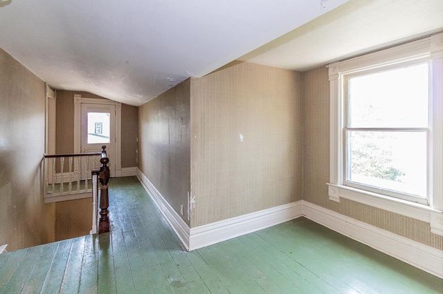 211 E WOLF RIVER AVENUE, New London, WI 54961