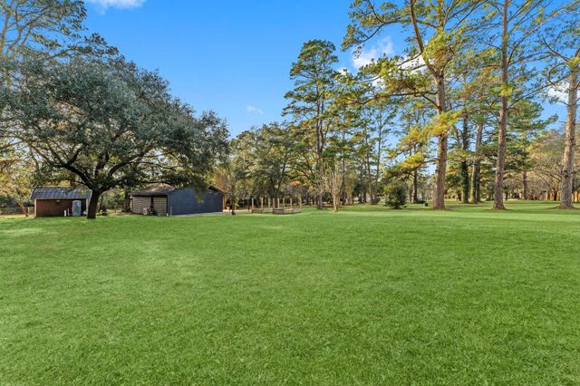 303 W Rollingwood Street, Pinehurst, TX 77362