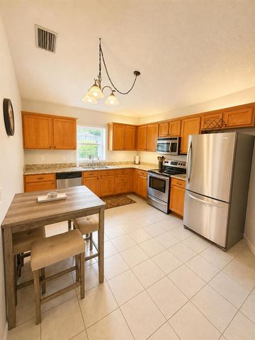 402 SE Strait Avenue, Port St. Lucie, FL 34983