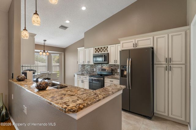 1424 Pinewood Hills Court, Spring Hill, FL 34606