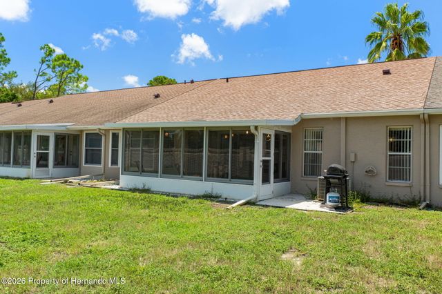 1424 Pinewood Hills Court, Spring Hill, FL 34606