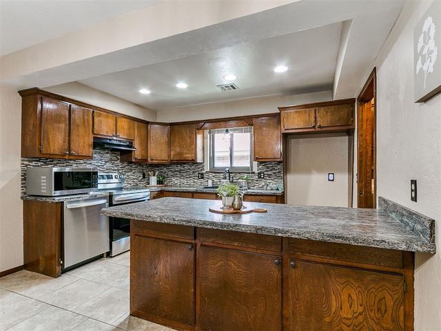 8908 N McMillan Avenue, Oklahoma City, OK 73132
