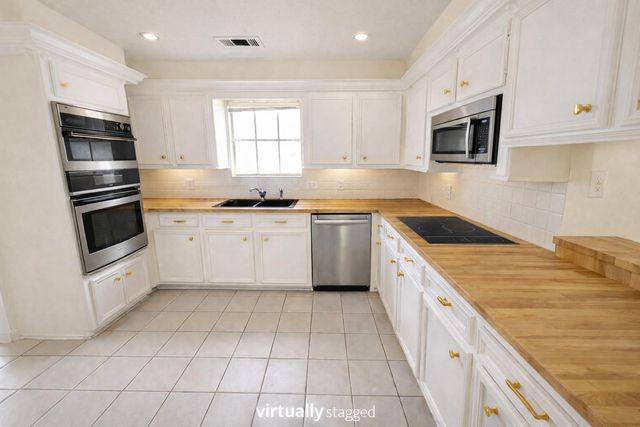 449 Stephen F Austin Drive, Conroe, TX 77302