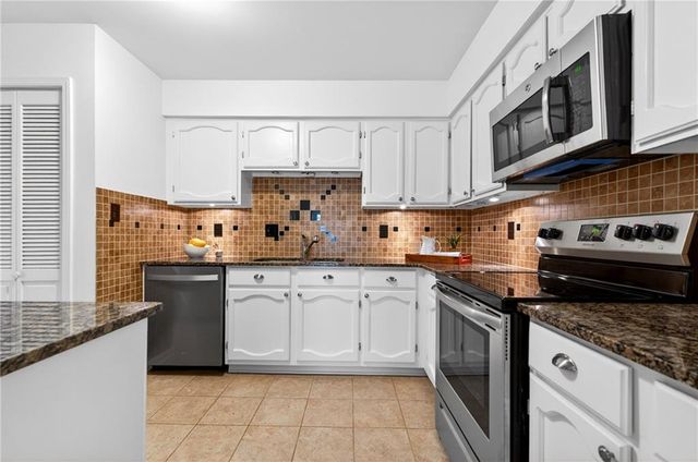 4590 VILLAGE OAKS Circle, Dunwoody, GA 30338