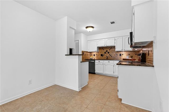 4590 VILLAGE OAKS Circle, Dunwoody, GA 30338