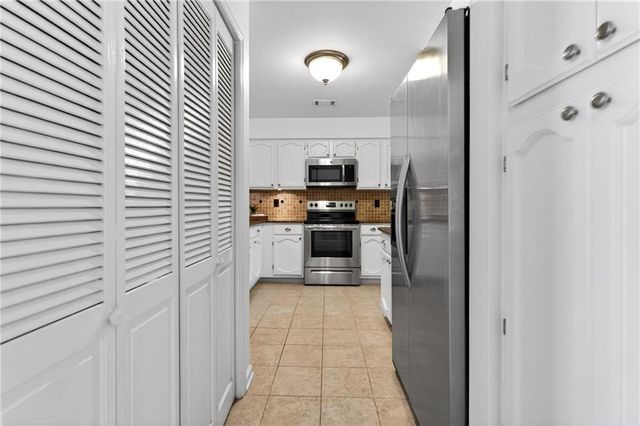 4590 VILLAGE OAKS Circle, Dunwoody, GA 30338