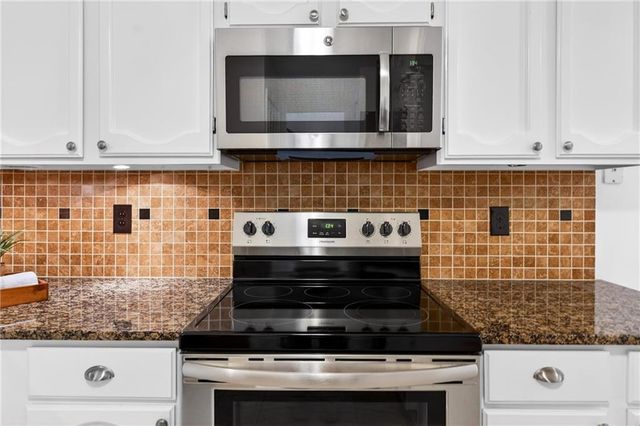 4590 VILLAGE OAKS Circle, Dunwoody, GA 30338