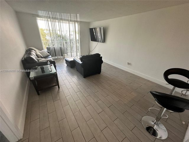 486 NW 165th Street b-303, Miami, FL 33169