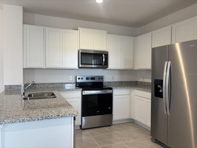 1438 ACORN MEADOW LOOP, Eustis, FL 32726