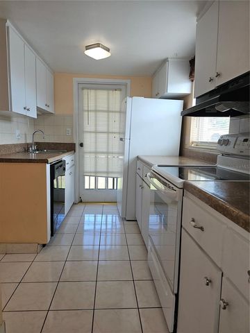 7701 STARKEY ROAD 102, Seminole, FL 33777