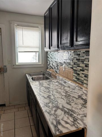 1205 STOCKER Avenue, Flint, MI 48503