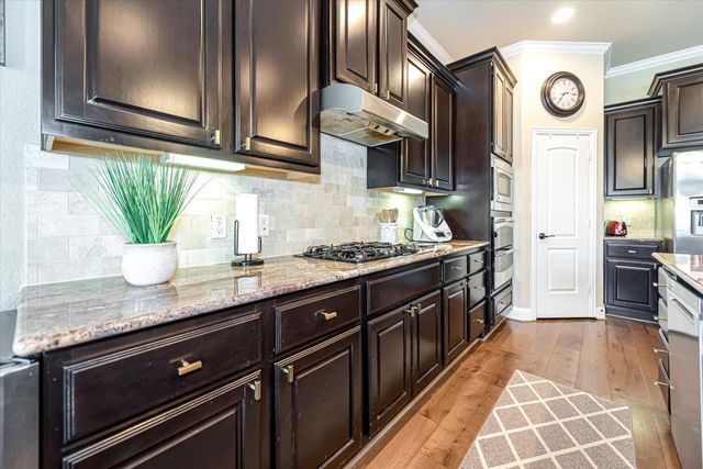 6 Camplight Court, Spring, TX 77389