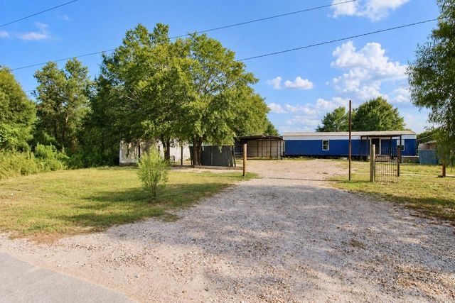 282 County Road 3406, Cleveland, TX 77327