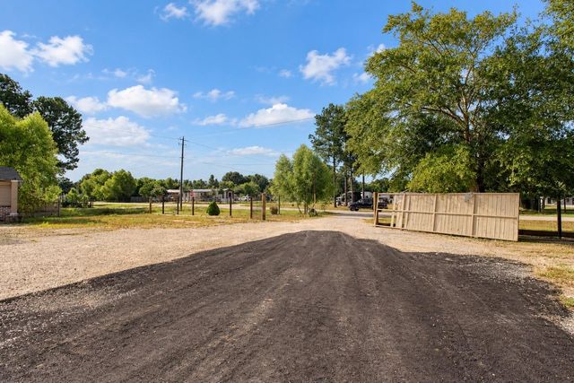 282 County Road 3406, Cleveland, TX 77327