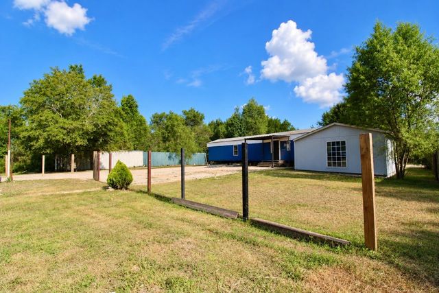 282 County Road 3406, Cleveland, TX 77327