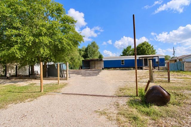 282 County Road 3406, Cleveland, TX 77327