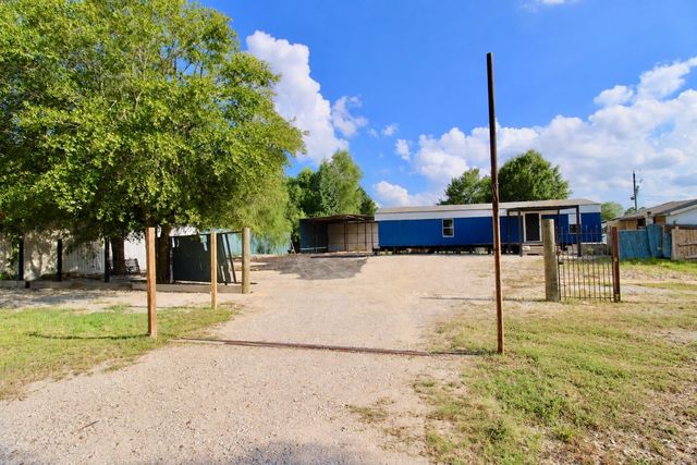 282 County Road 3406, Cleveland, TX 77327