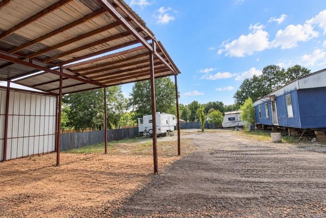 282 County Road 3406, Cleveland, TX 77327