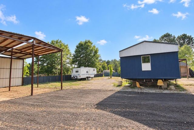 282 County Road 3406, Cleveland, TX 77327