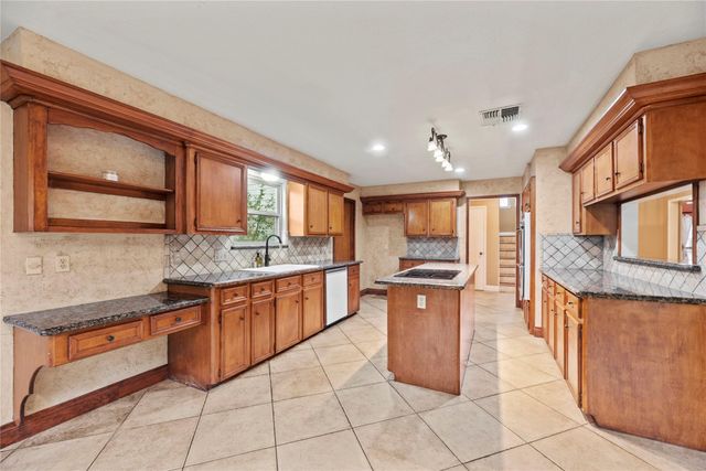 7711 Brook Springs Drive, Houston, TX 77095