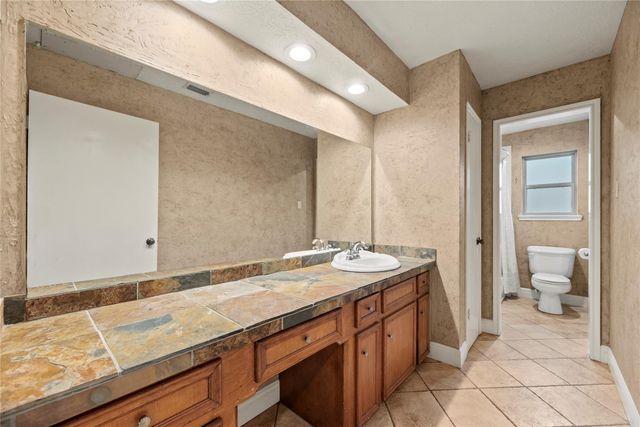 7711 Brook Springs Drive, Houston, TX 77095